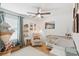 Cozy Bedroom with crib, glider chair, and ceiling fan at 1077 Farmington Rd, Charleston, SC 29412