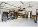 Spacious two car garage with an assortment of shelving and supplies at 1077 Farmington Rd, Charleston, SC 29412