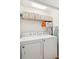 Functional laundry room with washer, dryer, and storage shelves at 1077 Farmington Rd, Charleston, SC 29412