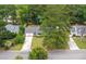 Charming home with a well-manicured lawn, mature trees, and a two-car garage at 109 Lakeview Dr, Summerville, SC 29485