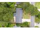 Aerial view of the home, showcasing the backyard, wooden deck, and lush, green surroundings at 109 Lakeview Dr, Summerville, SC 29485