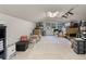 Unfinished attic providing ample storage space, a window for natural light, and a simple lighting fixture at 109 Lakeview Dr, Summerville, SC 29485
