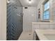 Updated bathroom features sleek design with subway tiles and modern fixtures with a unique rainfall shower head at 109 Lakeview Dr, Summerville, SC 29485