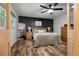 Stylish bedroom with a black accent wall, plush bed, and modern furnishings, providing a relaxing retreat at 109 Lakeview Dr, Summerville, SC 29485