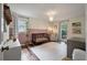 Charming Bedroom with a decorative wainscoting, stylish light fixture, and ample space at 109 Lakeview Dr, Summerville, SC 29485