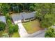 Beautiful exterior of a home with a well-manicured front yard, mature trees, and a two-car garage at 109 Lakeview Dr, Summerville, SC 29485