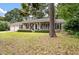 Charming single-story brick home with front porch and lush lawn at 109 Lakeview Dr, Summerville, SC 29485