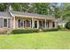 Well-maintained brick home with beautiful front lawn and garden at 109 Lakeview Dr, Summerville, SC 29485