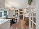 Eat-in kitchen featuring stainless appliances, wood floors, and a chandelier over a round table at 109 Lakeview Dr, Summerville, SC 29485