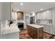 Modern kitchen features stainless appliances, a wood center island, and white subway tile backsplash at 109 Lakeview Dr, Summerville, SC 29485