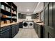 Well-organized laundry room with ample storage, modern washer and dryer, and a practical design at 109 Lakeview Dr, Summerville, SC 29485