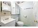 Cozy bathroom features a vanity, toilet, and themed wallpaper with light fixtures at 109 Rahway Rd, Goose Creek, SC 29445