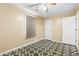 Bedroom featuring geometric tile flooring, ceiling fan, and painted walls at 109 Rahway Rd, Goose Creek, SC 29445