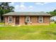 Charming brick home with well-maintained lawn, inviting curb appeal at 109 Rahway Rd, Goose Creek, SC 29445