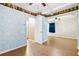Open hallway connecting rooms, featuring patterned walls and access to multiple living spaces at 109 Rahway Rd, Goose Creek, SC 29445
