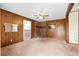 Inviting living room with paneled walls and a cozy brick fireplace at 109 Rahway Rd, Goose Creek, SC 29445
