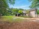 Spacious yard with a covered patio ideal for outdoor relaxation and entertaining at 113 Mapperton Ct, Summerville, SC 29485