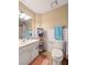 Bathroom featuring a sink, toilet, and a towel rack at 113 Mapperton Ct, Summerville, SC 29485