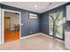 Cozy breakfast nook with a window and blue accent wall and wood floors at 113 Mapperton Ct, Summerville, SC 29485