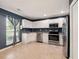 Bright kitchen featuring stainless steel appliances, ample counter space, and light wood floors at 113 Mapperton Ct, Summerville, SC 29485