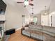 Spacious living room features a gray sofa, fireplace and views of the dining area at 113 Mapperton Ct, Summerville, SC 29485