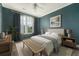 Stylish bedroom featuring a large window, comfortable bed, and modern decor at 130 River Landing Dr # 2310, Daniel Island, SC 29492