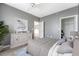 Cozy bedroom with a comfortable bed and plenty of storage space, decorated with plants at 130 River Landing Dr # 2310, Daniel Island, SC 29492