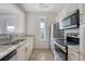 Well-equipped kitchen with granite countertops and stainless steel appliances at 130 River Landing Dr # 2310, Daniel Island, SC 29492