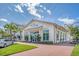 The Dime Eatery features a modern design with large windows and a welcoming brick pathway at 130 River Landing Dr # 2310, Daniel Island, SC 29492