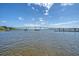 Expansive water view featuring a bridge, boats, and a clear blue sky on a sunny day at 130 River Landing Dr # 2310, Daniel Island, SC 29492