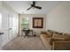 Cozy bedroom with a closet, desk, a comfortable couch, and carpeted flooring at 132 Daniels Ridge Dr, Summerville, SC 29485