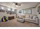 Inviting living room with comfortable seating and unique decorative wall art and a ceiling fan at 132 Daniels Ridge Dr, Summerville, SC 29485