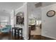 Open living space with a breakfast bar, kitchen, and dining area, creating a seamless flow for entertaining and daily living at 132 Daniels Ridge Dr, Summerville, SC 29485