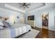 The main bedroom features hardwood floors, a ceiling fan, and a walk-in closet, offering ample storage and comfort at 132 Daniels Ridge Dr, Summerville, SC 29485