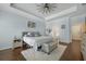 This main bedroom features hardwood floors, tray ceiling, and a soft rug, creating a relaxing, stylish retreat at 132 Daniels Ridge Dr, Summerville, SC 29485
