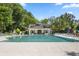 A gorgeous community pool area with plenty of seating for residents to enjoy in a relaxing outdoor setting at 132 Daniels Ridge Dr, Summerville, SC 29485