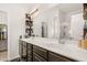 Modern bathroom with dual sinks, spacious countertop, and large mirror with vanity lighting at 132 Wild Holly Dr, Moncks Corner, SC 29461
