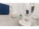 Cozy half bath features a corner sink, floating shelves, and soft accent lighting at 132 Wild Holly Dr, Moncks Corner, SC 29461