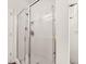 Clean bathroom featuring a glass-enclosed shower with modern fixtures and white tile surround at 132 Wild Holly Dr, Moncks Corner, SC 29461