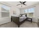 Cozy bedroom with ample natural light, ceiling fan, and neutral-toned decor at 132 Wild Holly Dr, Moncks Corner, SC 29461