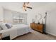Bedroom showcasing soothing decor, round mirror, dresser, and contemporary light fixtures at 132 Wild Holly Dr, Moncks Corner, SC 29461