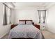 Bright bedroom with wooden bed frame, matching side tables, and soft gray patterned bedding at 132 Wild Holly Dr, Moncks Corner, SC 29461
