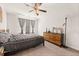 This bedroom features a ceiling fan and a dresser decorated with vases at 132 Wild Holly Dr, Moncks Corner, SC 29461