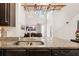 Modern kitchen with granite countertops, stainless steel appliances, and custom glass rack at 132 Wild Holly Dr, Moncks Corner, SC 29461