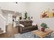 Inviting living room boasts an open floor plan and flows into the kitchen and dining area at 132 Wild Holly Dr, Moncks Corner, SC 29461