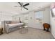 Relaxing loft area featuring comfortable daybed, neutral carpet, and bright windows at 132 Wild Holly Dr, Moncks Corner, SC 29461