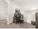 Functional office space with a computer setup, whiteboard, and natural light from a nearby window at 132 Wild Holly Dr, Moncks Corner, SC 29461