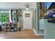 Bright entryway featuring hardwood floors, and large window views at 1549 N Avalon Cir, Charleston, SC 29407