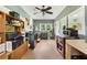 A versatile laundry room with ample storage, shelving, and a tile floor provides utility and style at 1549 N Avalon Cir, Charleston, SC 29407