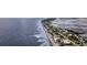 Picturesque aerial view showcasing the beachfront homes along the coastline with ocean views at 1568 E Ashley Ave, Folly Beach, SC 29439